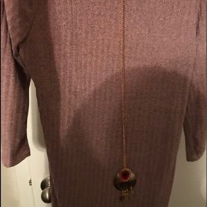 Light tan dress new without tags! It runs small